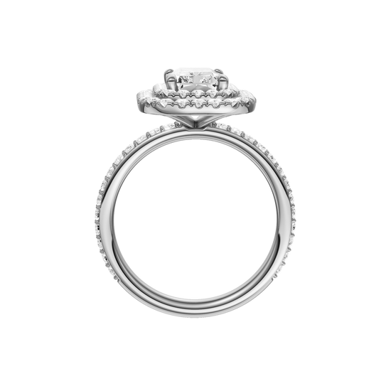 A profile view of the Radiant cut diamond engagement ring in 14k white gold with a prong diamond band and cathedral setting