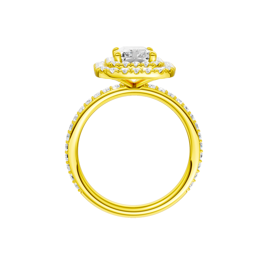 A profile view of the Radiant cut diamond engagement ring in 14k yellow gold with a prong diamond band and cathedral setting