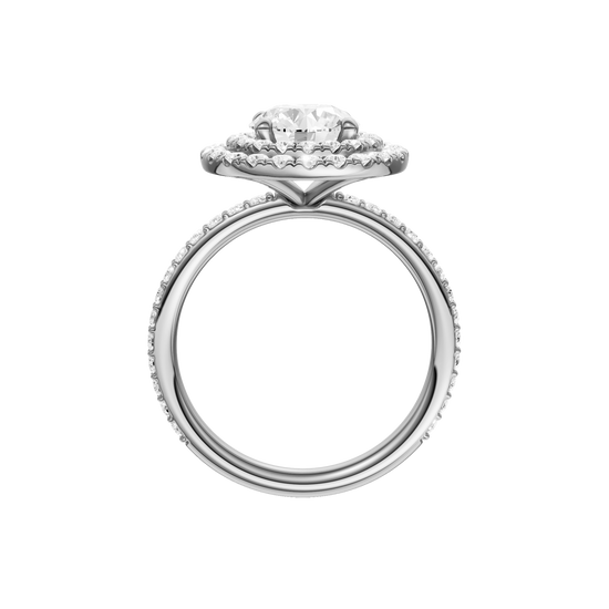 A profile view of the Round cut diamond engagement ring in platinum with a prong diamond band and cathedral setting