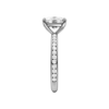 A side view of the Elongated cushion cut diamond engagement ring in platinum with a diamond channel band and cathedral setting