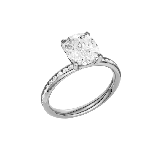 A three-quarter view of the Elongated cushion cut diamond engagement ring in platinum with a diamond channel band and cathedral setting