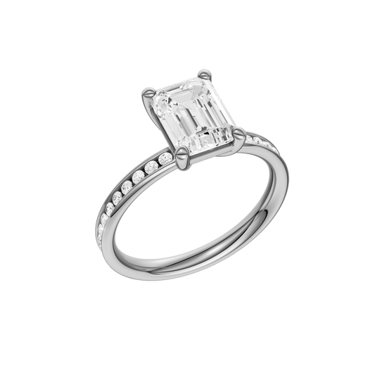 A three-quarter view of the Emerald cut diamond engagement ring in 14k white gold with a diamond channel band and cathedral setting