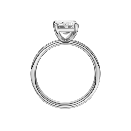 A profile view of the Emerald cut diamond engagement ring in 14k white gold with a diamond channel band and cathedral setting