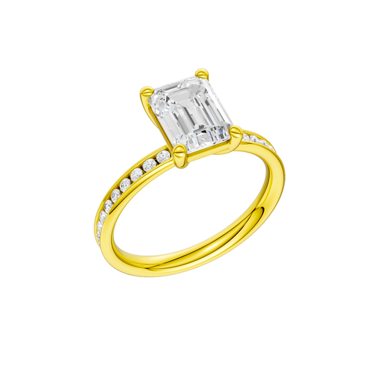 A three-quarter view of the Emerald cut diamond engagement ring in 14k yellow gold with a diamond channel band and cathedral setting