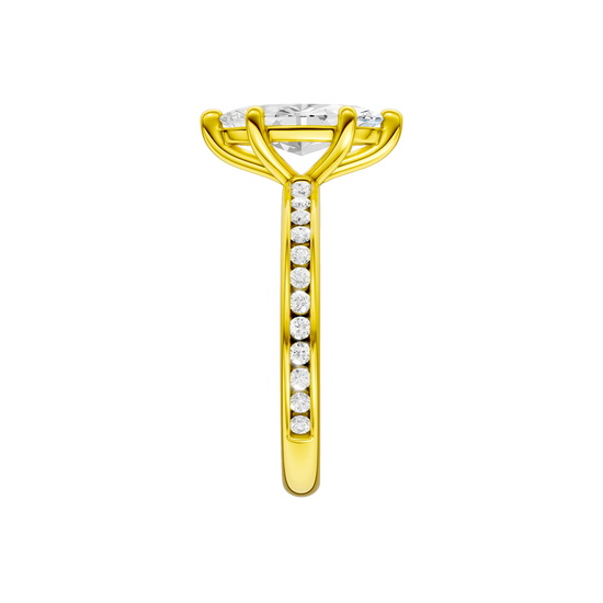A side view of the Marquise cut diamond engagement ring in 14k yellow gold with a diamond channel band and cathedral setting
