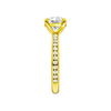 A side view of the Round cut diamond engagement ring in 14k yellow gold with a diamond channel band and cathedral setting