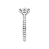 A side view of the Elongated Cushion cut diamond engagement ring in 14k white gold with a channel band and hidden halo setting