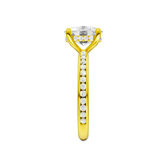 A side view of the Elongated Cushion cut diamond engagement ring in 14k yellow gold with a channel band and hidden halo setting