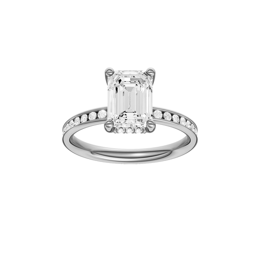 A front view of the Emerald cut diamond engagement ring in 14k white gold with a diamond channel band and cathedral setting