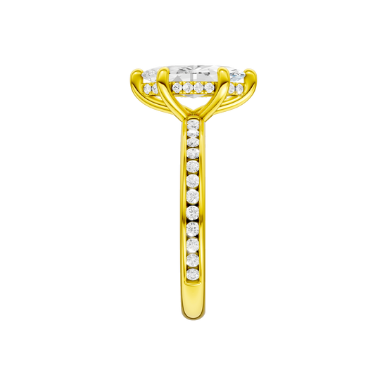 A side view of the Marquise cut diamond engagement ring in 14k yellow gold with a diamond channel band and cathedral setting