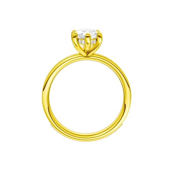 A profile view of the Marquise cut diamond engagement ring in 14k yellow gold with a diamond channel band and cathedral setting