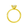 A profile view of the Marquise cut diamond engagement ring in 14k yellow gold with a diamond channel band and cathedral setting