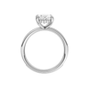 A profile view of the Oval cut diamond engagement ring in platinum with a diamond channel band and cathedral setting