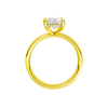 A profile view of the Oval cut diamond engagement ring in 14k yellow gold with a diamond channel band and cathedral setting