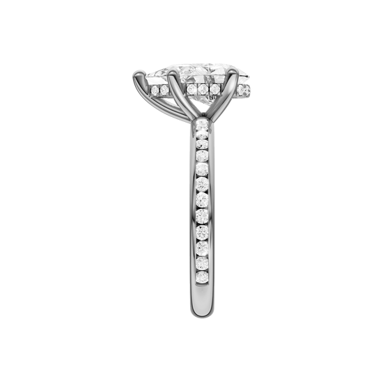 A side view of the Pear cut diamond engagement ring in 14k white gold with a diamond channel band and cathedral setting
