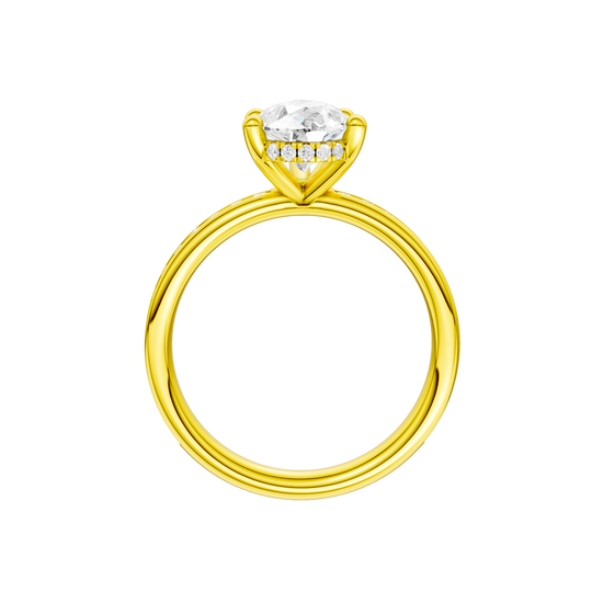 A profile view of the Pear cut diamond engagement ring in 14k yellow gold with a diamond channel band and cathedral setting