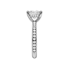 A side view of the Princess cut diamond engagement ring in 14k white gold with a diamond channel band and cathedral setting