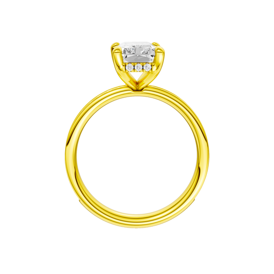 A profile view of the Radiant cut diamond engagement ring in 14k yellow gold with a diamond channel band and cathedral setting