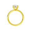 A profile view of the Round cut diamond engagement ring in 14k yellow gold with a diamond channel band and cathedral setting