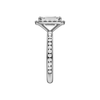 14K white gold emerald cut halo engagement ring side view detailing cathedral structure and diamond channel band.