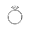 14K white gold pear halo engagement ring full band profile featuring continuous channel set diamonds and cathedral mounted pear halo center.