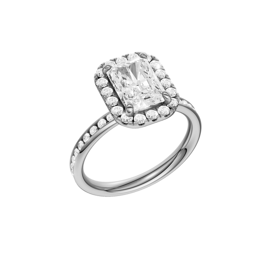 A three-quarter view of the Radiant cut diamond engagement ring in 14k white gold with a diamond channel band and cathedral setting