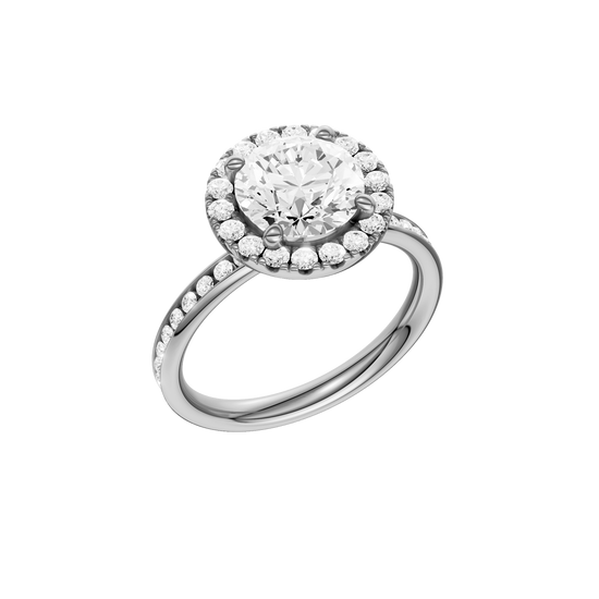 A three-quarter view of the Round cut diamond engagement ring in 14k white gold with a diamond channel band and halo setting