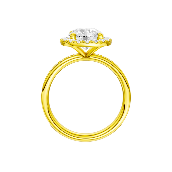 A profile view of the Round cut diamond engagement ring in 14k yellow gold with a diamond channel band and halo setting