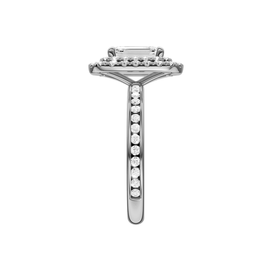 A side view of the Emerald cut diamond engagement ring in 14k white gold  with a channel band and double halo setting