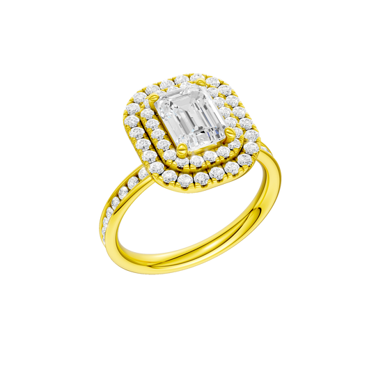 A three-quarter view of the Emerald cut diamond engagement ring in 14k yellow gold  with a channel band and double halo setting
