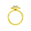 A profile view of the Emerald cut diamond engagement ring in 14k yellow gold  with a channel band and double halo setting