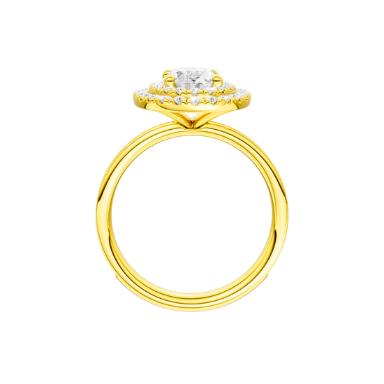 A profile view of the Oval cut diamond engagement ring in 14k yellow gold with a diamond channel band and cathedral setting