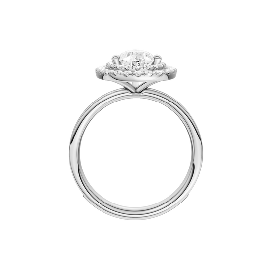 A profile view of the Pear cut diamond engagement ring in platinum with a diamond channel band and cathedral setting