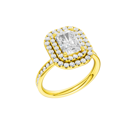 A three-quarter view of the Radiant cut diamond engagement ring in 14k yellow gold with a diamond channel band and cathedral setting