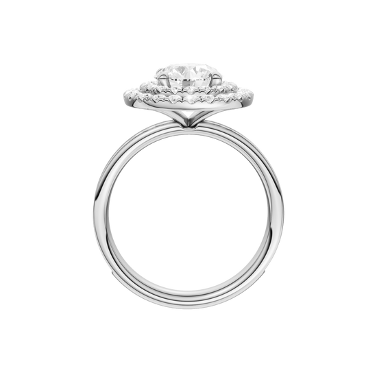 A profile view of the Round cut diamond engagement ring in 14k white gold with a diamond channel band and cathedral setting