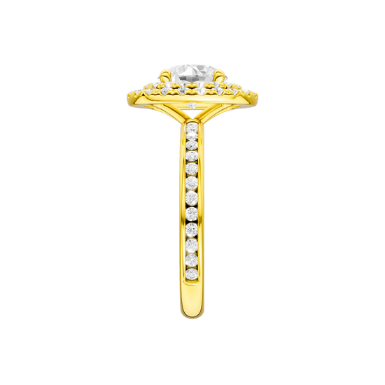 A side view of the Round cut diamond engagement ring in 14k yellow gold with a diamond channel band and cathedral setting