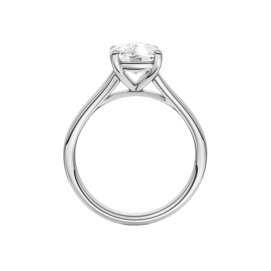 A profile view of the Elongated cushion cut diamond engagement ring in platinum with a plain band and split setting
