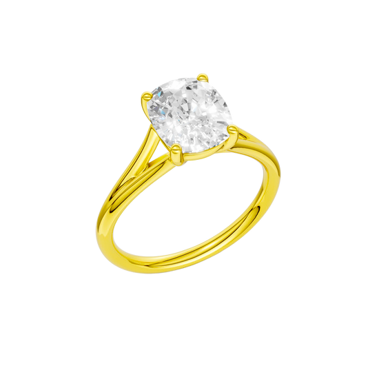 A  three-quarter view of the Elongated cushion cut diamond engagement ring in 14k yellow gold with a plain band and split setting