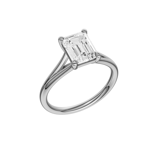 A three-quarter view of the Emerald cut diamond engagement ring in platinum with a plain band and split setting