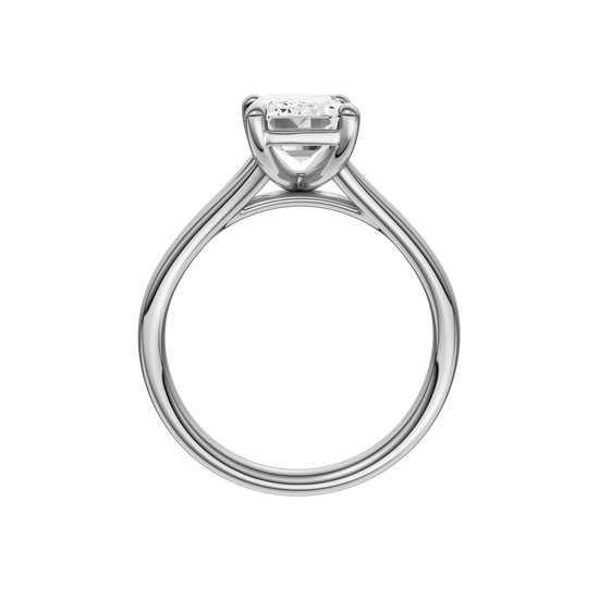 A profile view of the Emerald cut diamond engagement ring in platinum with a plain band and split setting