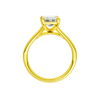 A profile view of the Emerald cut diamond engagement ring in 14k yellow gold with a plain band and split setting