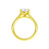 A profile view of the Pear cut diamond engagement ring in 14k yellow gold with a plain band and split setting