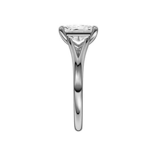 A side view of the Radiant cut diamond engagement ring in platinum with a plain band and split setting