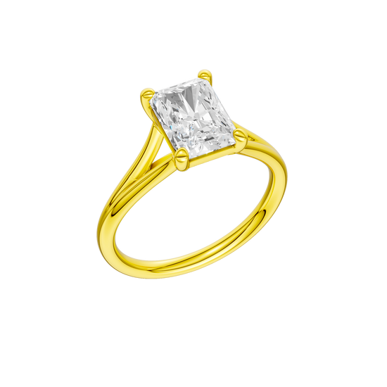 A three-quarter view of the Radiant cut diamond engagement ring in 14k yellow gold with a plain band and split setting