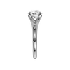 A side view of the Round cut diamond engagement ring in platinum with a plain band and solitaire setting