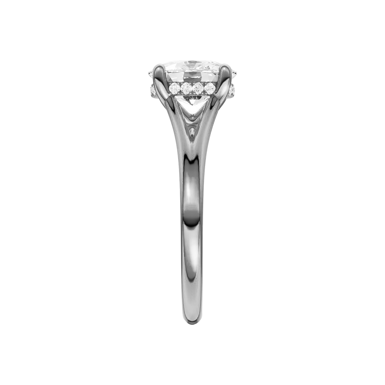 A side view of the Elongated Cushion cut diamond engagement ring in platinum with a plain band and hidden halo setting