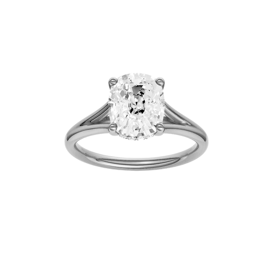 A front view of the Elongated Cushion cut diamond engagement ring in 14k white gold with a plain band and hidden halo setting