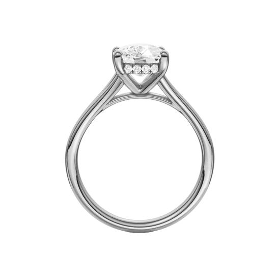 A profile view of the Elongated Cushion cut diamond engagement ring in platinum with a plain band and hidden halo setting