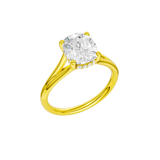 A three-quarter view of the Elongated Cushion cut diamond engagement ring in 14k yellow gold with a plain band and hidden halo setting