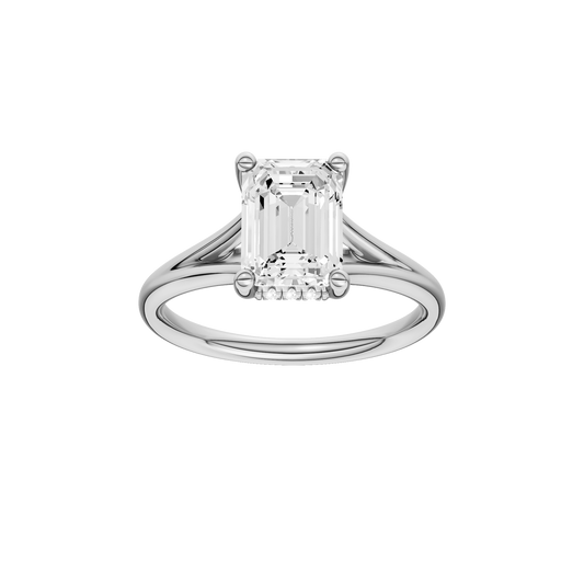 A front view of the Emerald cut diamond engagement ring in 14k white gold with a plain band and hidden halo setting